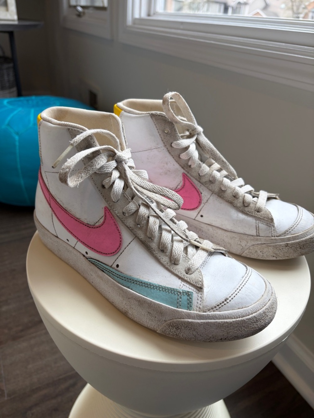Nike White High-Top Sneakers with Pink Swoosh and Teal Accent